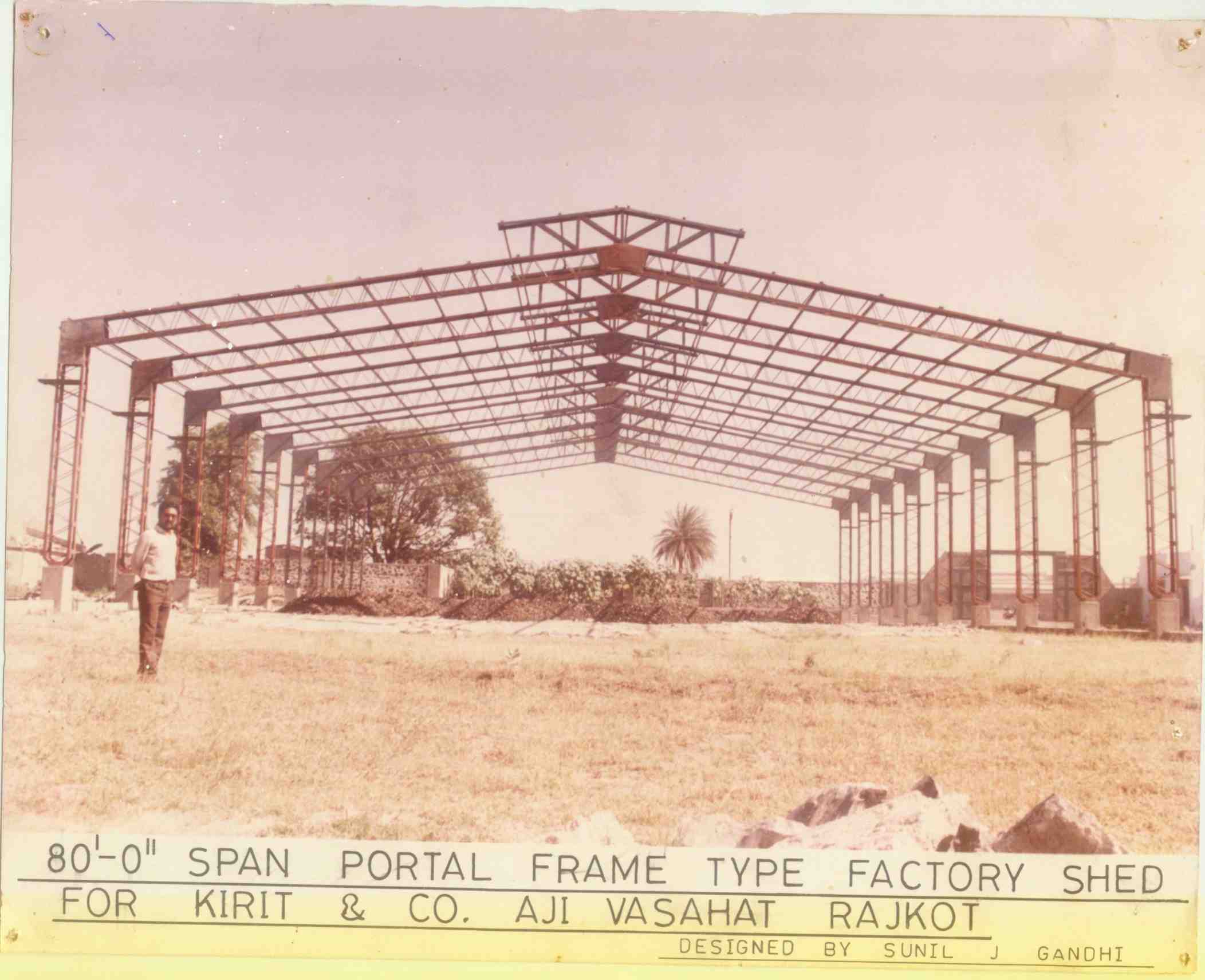 Hinged base portal frame